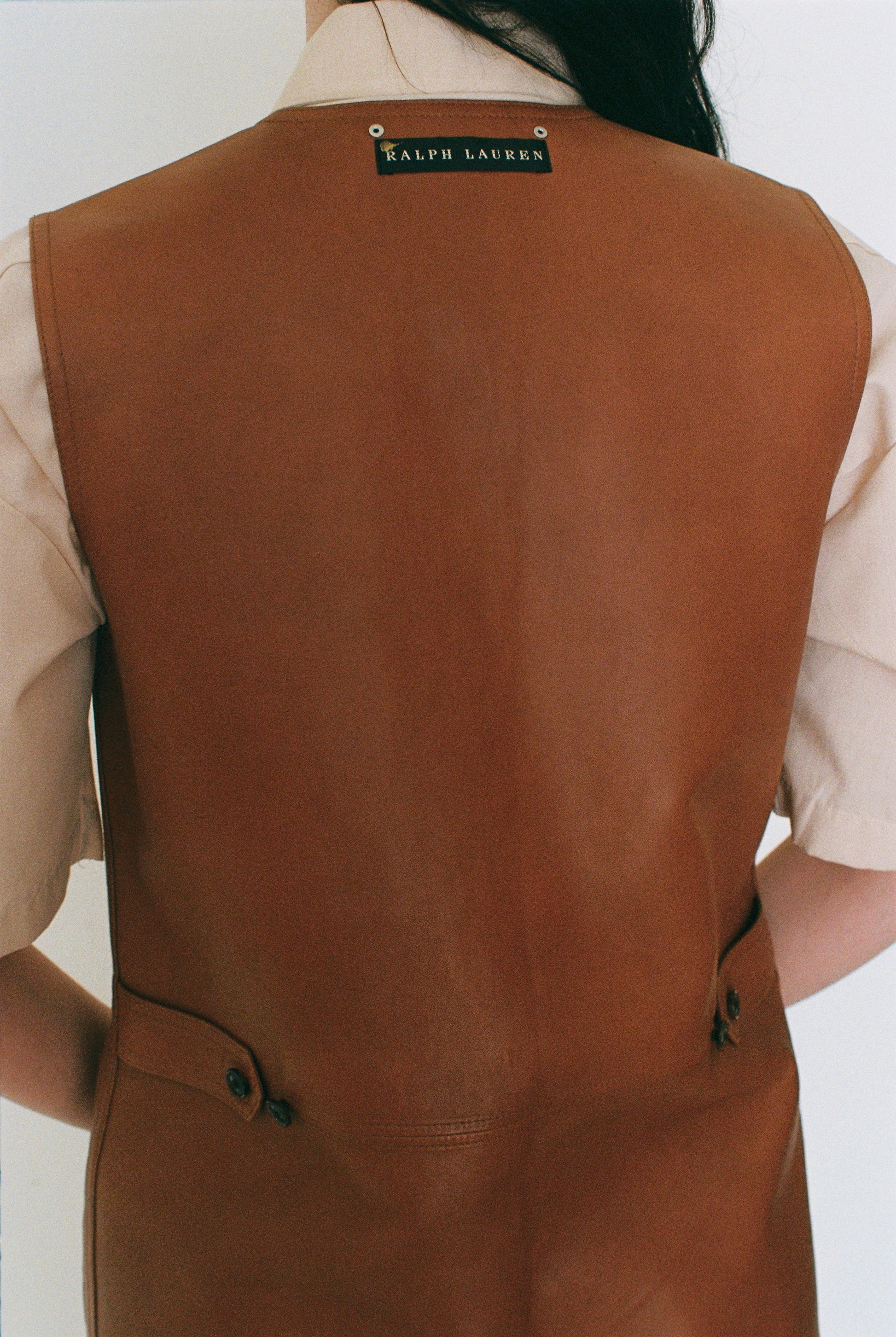 Brown vest with Ralph Lauren logo on a white background