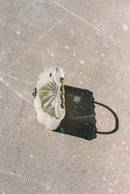 Small clear bag on a concrete surface