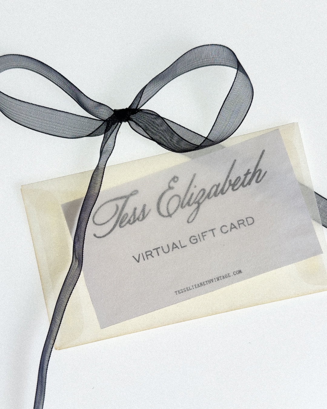 Tess Elizabeth virtual gift card with a black ribbon on a white background