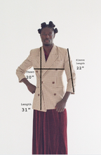 Person wearing a checkered jacket with measurements indicated on a white background