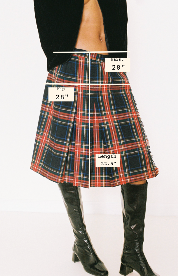 Plaid skirt with measurements labeled on a white background