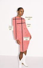 Model wearing a red checkered dress with measurements labeled on a white background