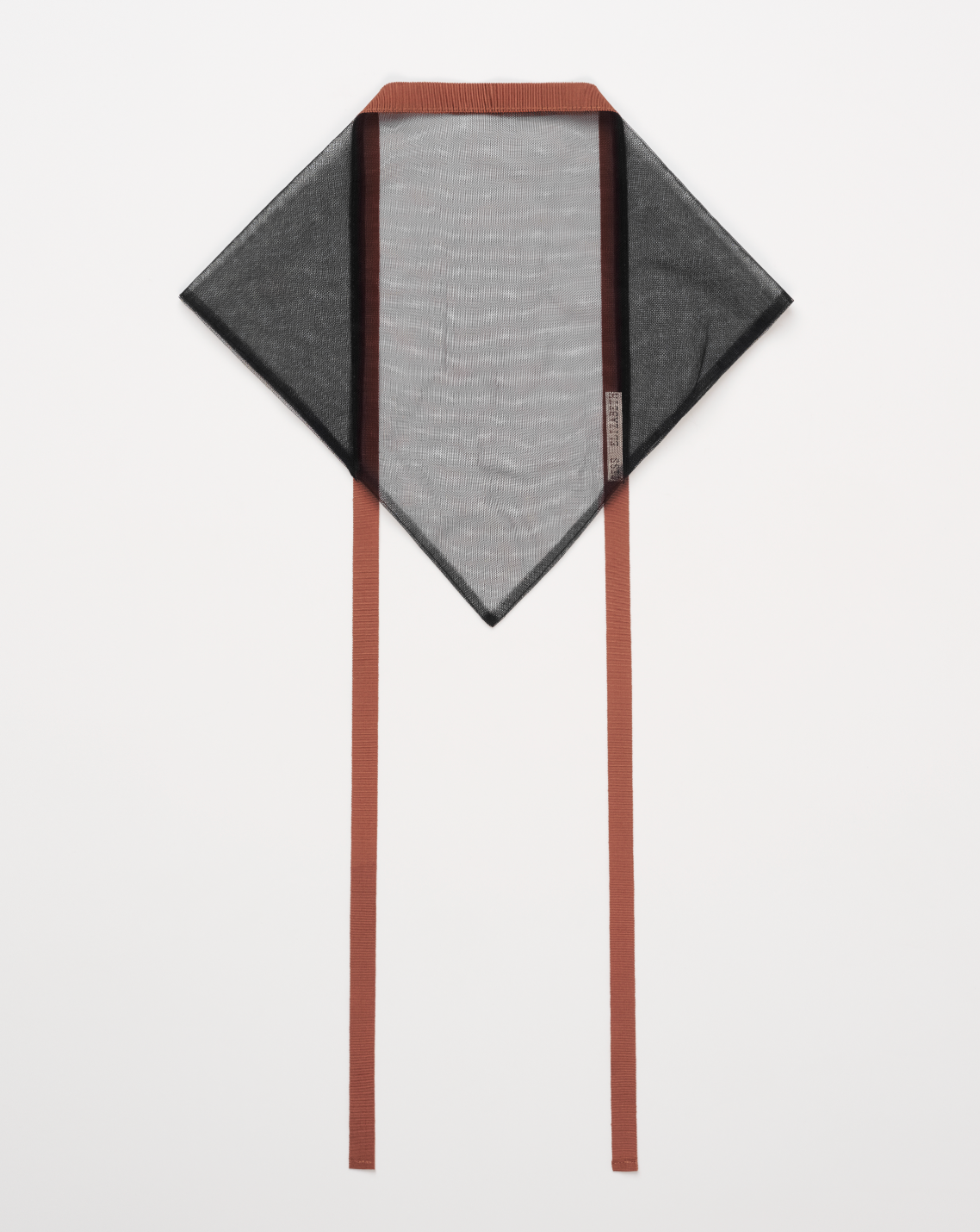 Black mesh headscarf with vintage ribbon trim laying on white background